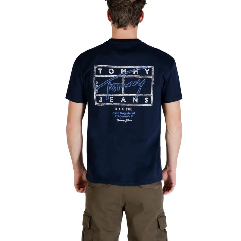 Back view of navy blue tommy hilfiger jeans men t shirt with white graphic print made of organic cotton in size s