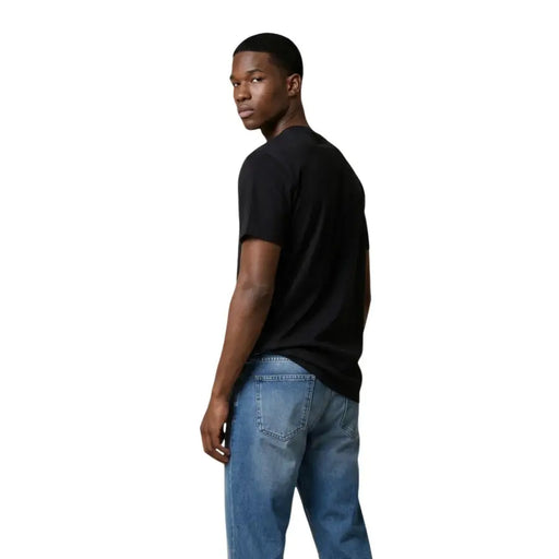 Schwarzes, kurzärmeliges Baumwollshirt mit Rundhalsausschnitt t-shirt für Männer von Tommy Hilfiger Jeans mit klassischem Passformdesign