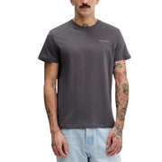 Dark gray Tommy Hilfiger Jeans men t-shirt featuring a small white logo on the left chest in cotton material