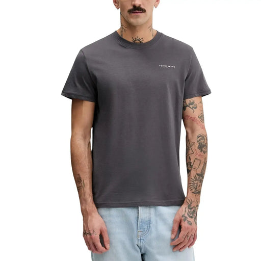Dark gray Tommy Hilfiger Jeans men t-shirt featuring a small white logo on the left chest in cotton material