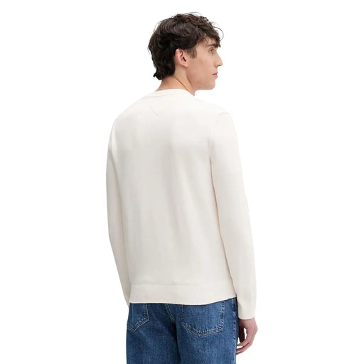 Tommy Hilfiger Jeans men cream knit sweater with ribbed crew neckline and cuffs made from organic cotton