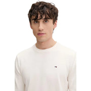 White long-sleeved crew neck knitwear sweater with small Tommy Hilfiger logo made from organic cotton for men
