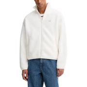 Men’s cream-colored fleece zip-up jacket from Tommy Hilfiger Jeans displayed with a white zip front turtleneck blazer