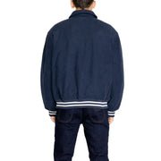 Men’s navy blue bomber jacket with white striped ribbed trim from Tommy Hilfiger Jeans