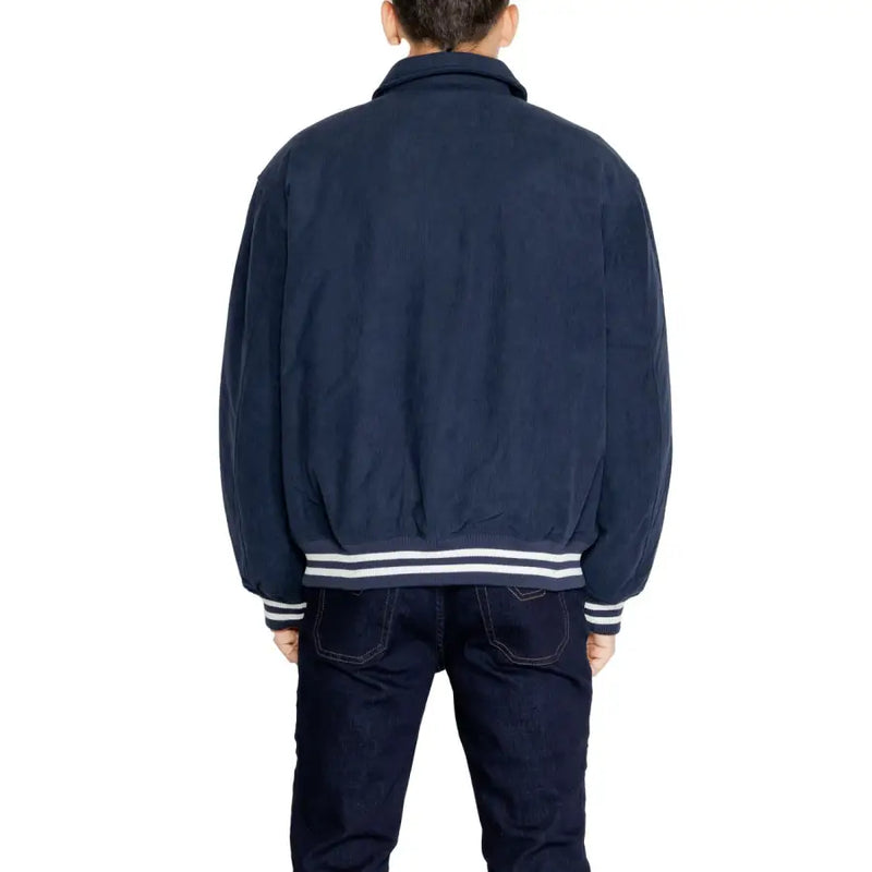 Men’s navy blue bomber jacket with white striped ribbed trim from Tommy Hilfiger Jeans