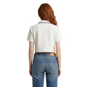 Cremefarbenes Kurzarm-Poloshirt mit marineblauem Besatz und Marken-Lederpatch am Bund von Tommy Hilfiger Jeans