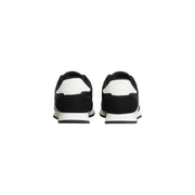 Tommy Hilfiger Schwarze Herren-Sneaker aus Polyester mit elegantem, modernem Design, kontrastierenden Einsätzen und pinkfarbenen Akzenten.