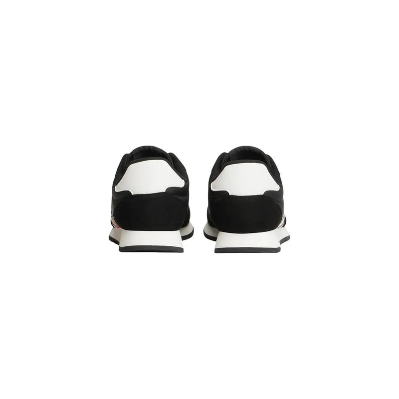 Tommy Hilfiger Schwarze Herren-Sneaker aus Polyester mit elegantem, modernem Design, kontrastierenden Einsätzen und pinkfarbenen Akzenten.