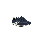 Marineblaue Tommy Hilfiger Herren-Sneaker mit rot-weiß-schwarz gestreiften Seiteneinsätzen aus Polyester.