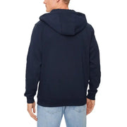 Men’s navy blue zip hooded sweatshirt paired with light blue jeans from Tommy Hilfiger
