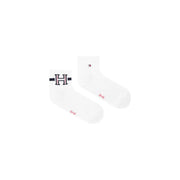 White ankle socks with bold black and pink h logo navy stripes and red heel branding for tommy hilfiger men boxer briefs