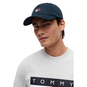 Marineblaue Tommy Hilfiger Herrenkappe aus Bio-Baumwolle mit rot-weiß-blauem Logo-Patch und verstellbarer Schnalle