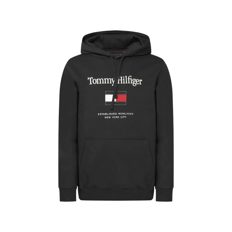 Schwarzer Tommy Hilfiger Herren-Hoodie aus Baumwollmischgewebe mit weißem Logo und Flaggenemblem, gegründet 1975 in New York City
