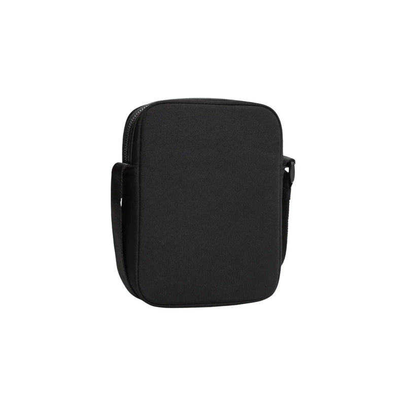 Tommy Hilfiger Schwarze Mini-Reportertasche für Herren aus Kunstleder mit strukturiertem Korpus und passendem Reißverschluss, Größe B 15 cm