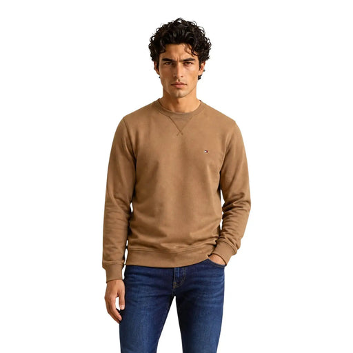 Tan Tommy Hilfiger crewneck sweatshirt made of cotton fleece with a small embroidered flag logo on left chest