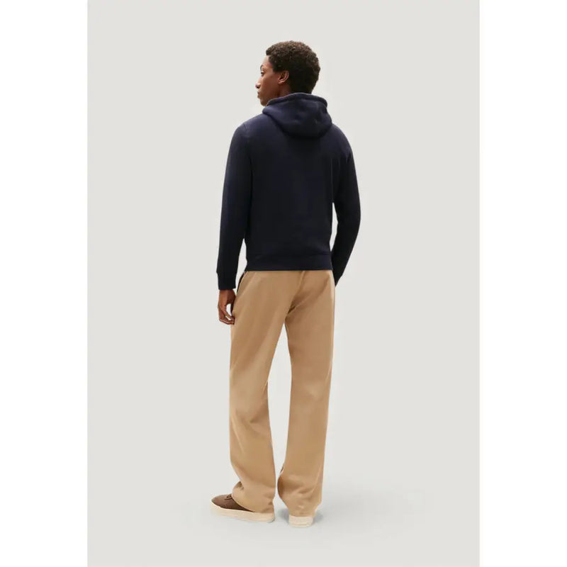 Tommy Hilfiger Herren-Hoodie aus marineblauer Baumwolle mit weichem, strukturiertem Strickmaterial und gerippten Bündchen und Saum.