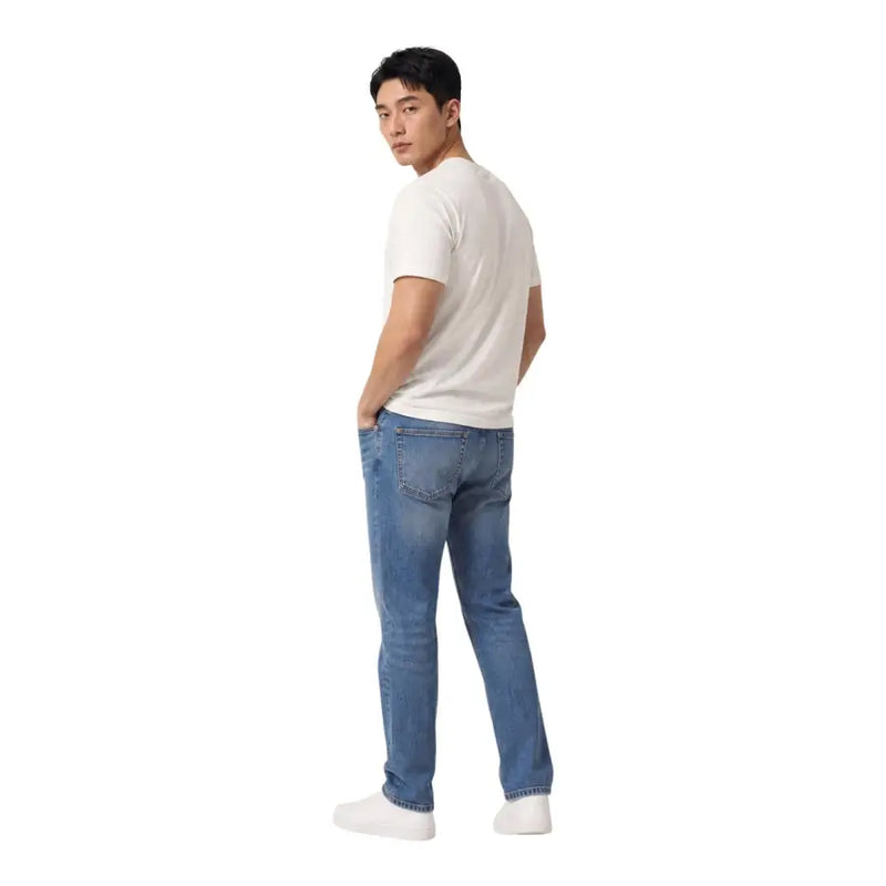 Tommy Hilfiger Herrenjeans, blau, schmal geschnitten, aus Bio-Baumwolle, mit klassischer Passform und dezenter Waschung.
