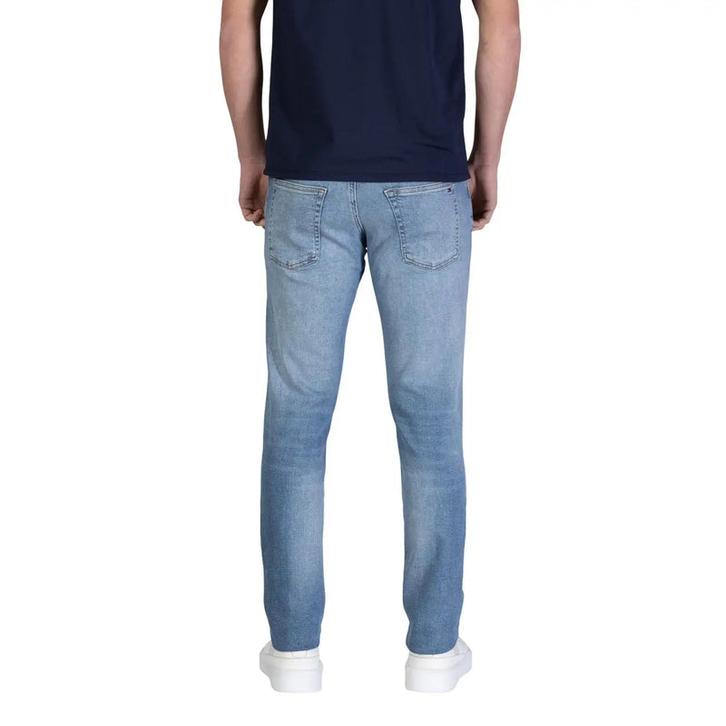 Back side of tommy hilfiger men jeans light blue slim fit made of organic cotton with classic pockets and subtle fading