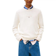 Cream-colored tommy hilfiger men’s knitwear crewneck sweater with organic cotton and subtle gold embroidery on chest