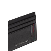 Black leather Tommy Hilfiger men wallet card holder with textured surface and signature red white and blue stitching