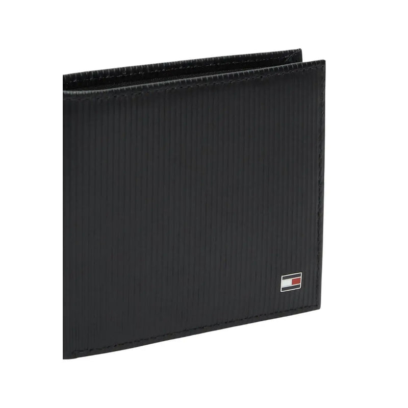Tommy Hilfiger men wallet black textured leather with vertical grain and embroidered logo on lower right corner