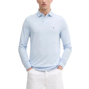 Tommy hilfiger light blue long-sleeve polo shirt with a small logo on the chest.