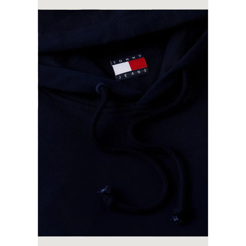 Black tommy jeans hoodie with classic logo patch and drawstrings complementing tommy hilfiger men organic cotton blue sweatshirt