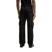Black cotton lycra cargo pants by Tommy Hilfiger men with multiple pockets and a relaxed fit from the front side