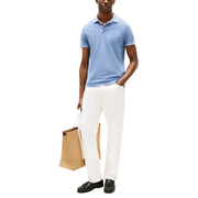 Hellblau Tommy Hilfiger Herren-Poloshirt mit kurzen Ärmeln, aus Baumwolle und mit kleinem, gesticktem Logo auf der Brust