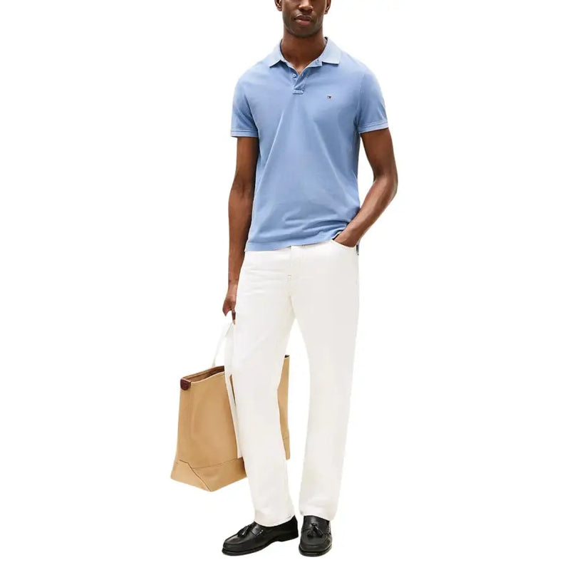 Hellblau Tommy Hilfiger Herren-Poloshirt mit kurzen Ärmeln, aus Baumwolle und mit kleinem, gesticktem Logo auf der Brust