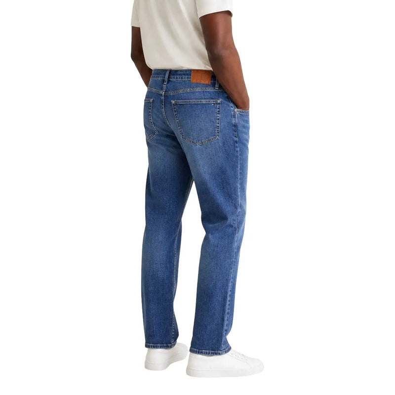 Tommy Hilfiger men Ryan slim straight blue denim jeans with classic five-pocket design and brown leather patch