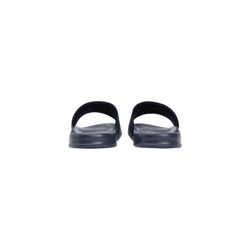 Tommy Hilfiger Schwarze Herren-Sandalen aus Gummi mit minimalistischem Design und offener Zehenpartie, Obermaterial aus Polyurethan.