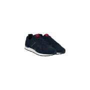 Tommy Hilfiger Herren-Sneaker aus blauem Polyester mit dunkelblauem Wildleder-Mesh-Obermaterial, rotem Markenlogo und weißen Gummisohlen.
