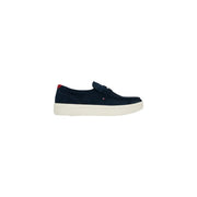 Navy blue suede loafers with white rubber sole and red heel tab from Tommy Hilfiger men spring summer collection