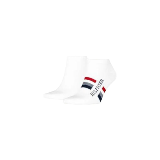 White Tommy Hilfiger men ankle socks featuring a red navy and gray striped logo on the side for underwear use
