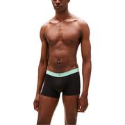 Black Tommy Hilfiger boxer briefs with light teal elastic waistband featuring the Tommy Hilfiger logo