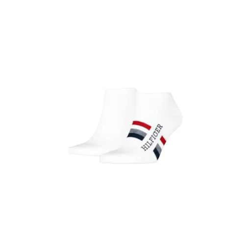 White Tommy Hilfiger men ankle socks featuring a red navy and gray striped logo on the side for underwear use