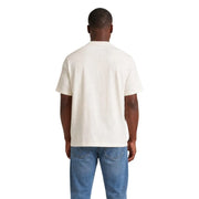 Cremefarbenes, kurzärmeliges Baumwoll-T-Shirt mit klassischem Rundhalsausschnitt von Tommy Hilfiger Herren-Kollektion aus weißer Bio-Baumwolle