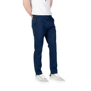 Tommy Hilfiger men’s navy blue chino pants with subtle logo on left thigh pocket suitable for casual wear