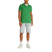 Tommy Hilfiger Grünes Herren-Sommerpoloshirt mit klassischem Kragen und kleinem Brustlogo für die Freizeit.