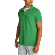 Tommy Hilfiger Grünes Herren-Sommerpoloshirt mit weißem Innenkragen und kleinem Brustlogo für die Freizeit.