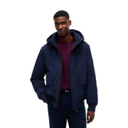 Tommy Hilfiger Steppjacke für Herren in Marineblau mit Frontreißverschluss und zwei Seitentaschen, Vorderansicht