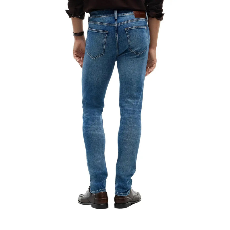 Tommy Hilfiger Bleecker Slim-Fit-Jeans für Herren aus blauem Denim mit braunem Lederpatch, Vorderansicht