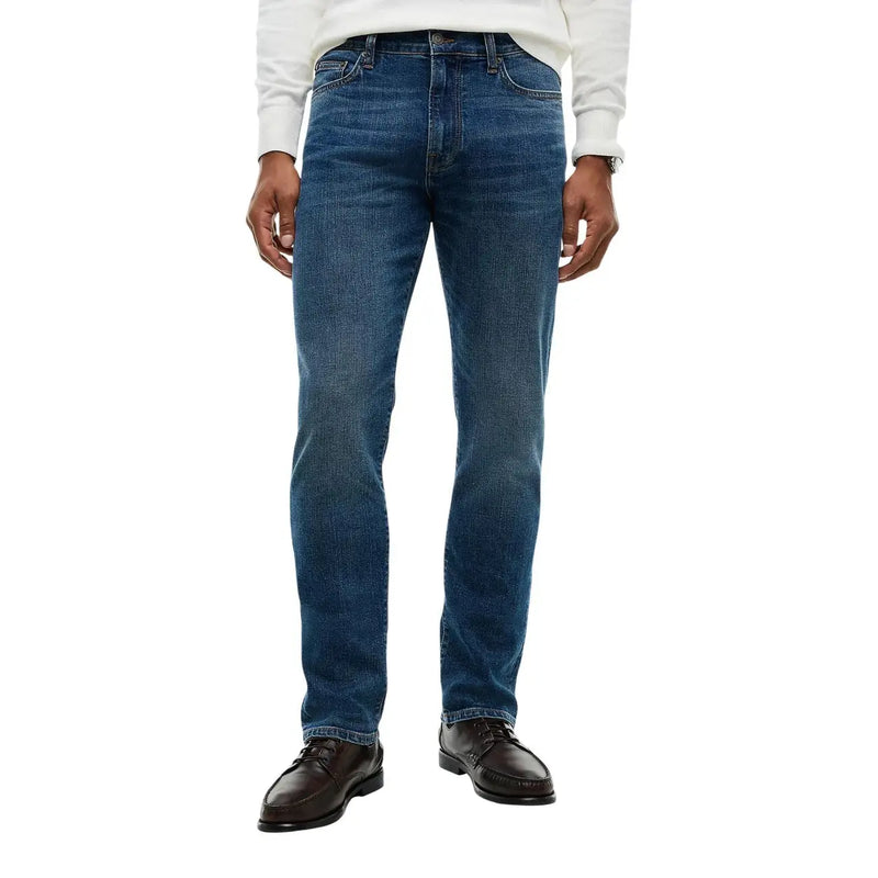 Tommy Hilfiger Schmal geschnittene Herrenjeans aus verwaschenem, blauem Denim mit dezenten Used-Effekten, Vorderansicht