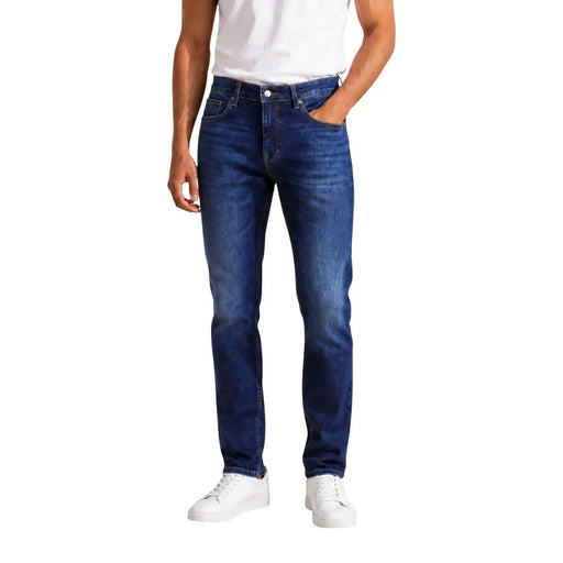 Tommy Hilfiger Schmal geschnittene Herrenjeans aus dunkelblauem Denim mit dezenter Waschung und geradem Bein, Vorderansicht