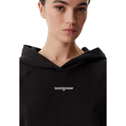 Black tommy hilfiger women hoodie made of organic cotton with white embroidered logo on the chest