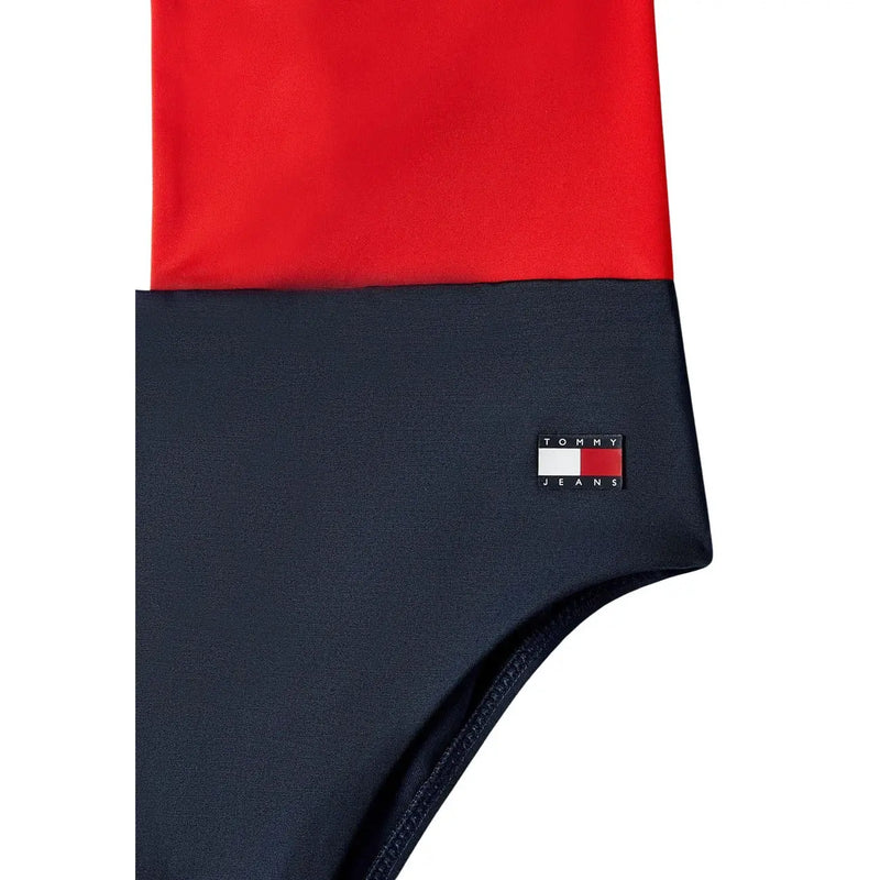 Tommy hilfiger women blue beachwear scoop neck nylon swimwear shown with red and navy blue two-tone Tommy jeans swim trunks