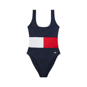 Navy blue tommy hilfiger women scoop neck nylon one-piece swimsuit with white and red horizontal stripe across torso