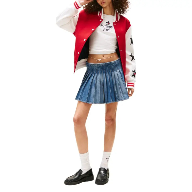 Tommy hilfiger women blue fall winter organic cotton skirt paired with red and white star patterned tommy girl varsity jacket