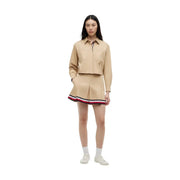 Tommy Hilfiger women skirt beige organic cotton mini with a beige cropped button-up shirt featuring two front pockets and logo patch